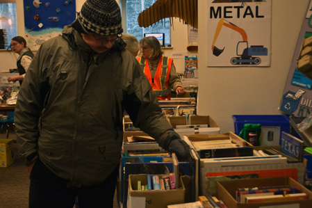 Andre checing out some books